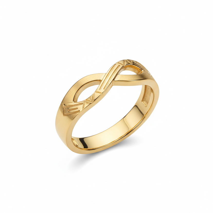 Gold plated infinity band ring with engraved pattern on white background