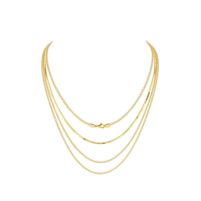 Delicate modern gold plated layered chain necklace on white background