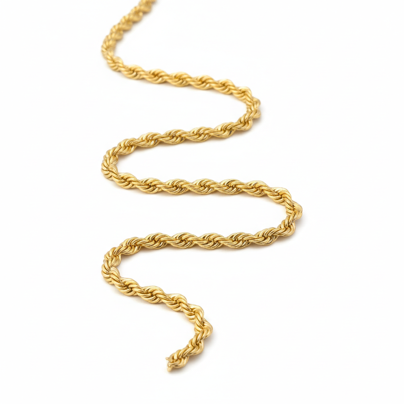 Classic gold plated rope chain necklace on white background
